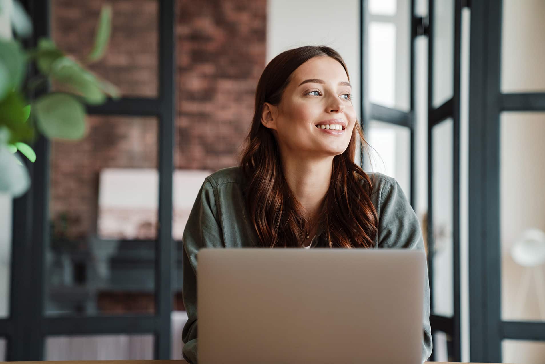 patient smiling while discussing CareCredit for Dental Financing