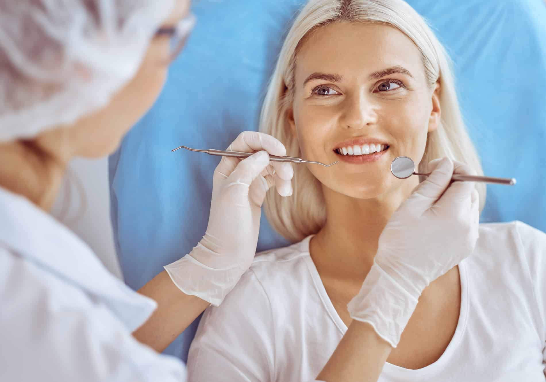 Woman at the periodontist for implant overdentures in Kingsport